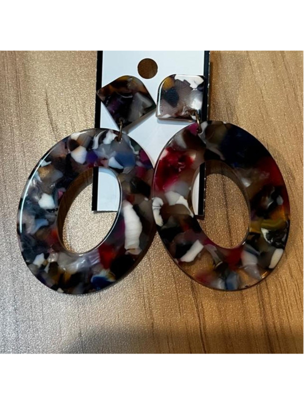 Oversized multicolor resin drop earrings with a retro tortoise/confetti pattern